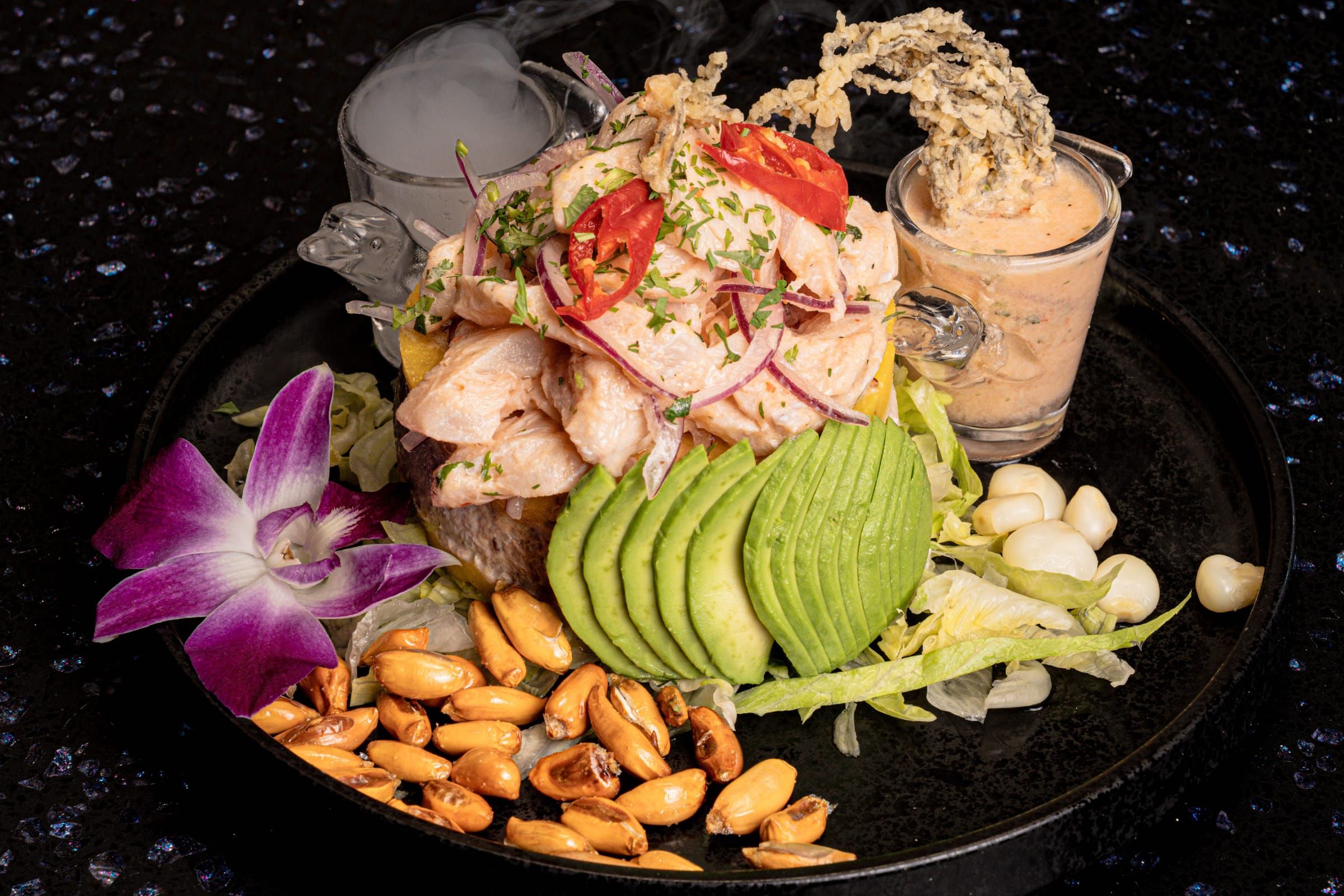 Acevichada causa topped with seafood