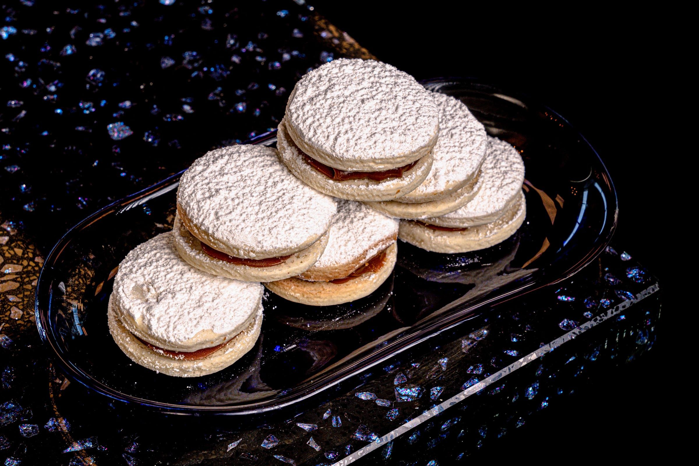 Alfajores dusted with powdered sugar