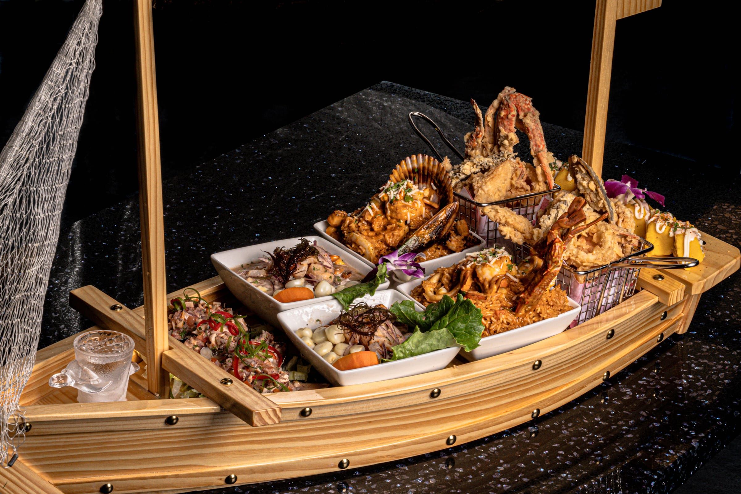 Buque Marino seafood feast served on a wooden boat