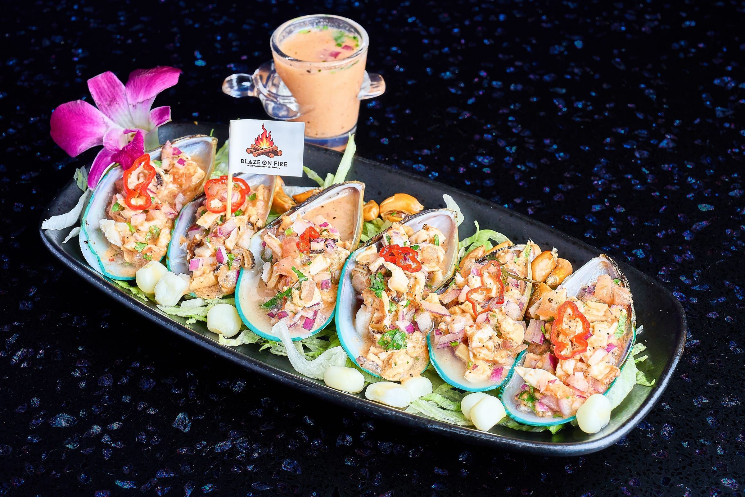 Six mussels chalaca style on the half shell