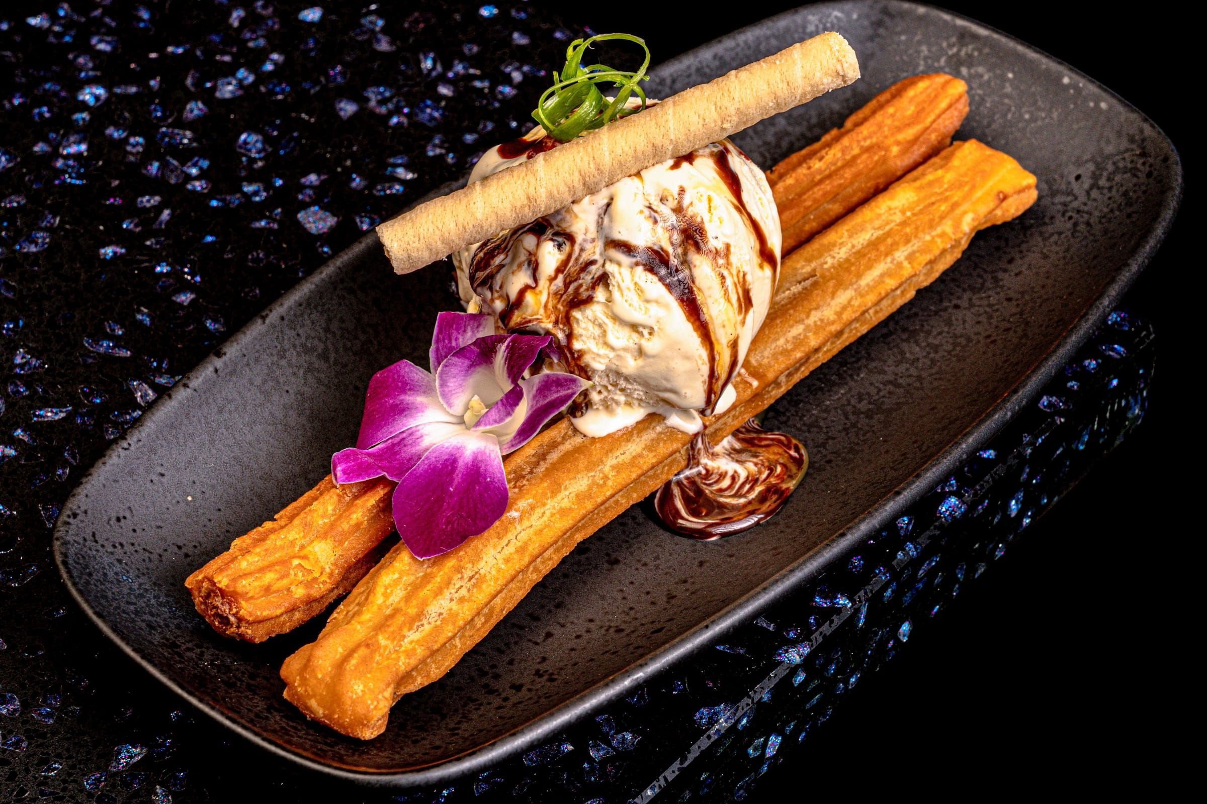 Churros served with ice cream