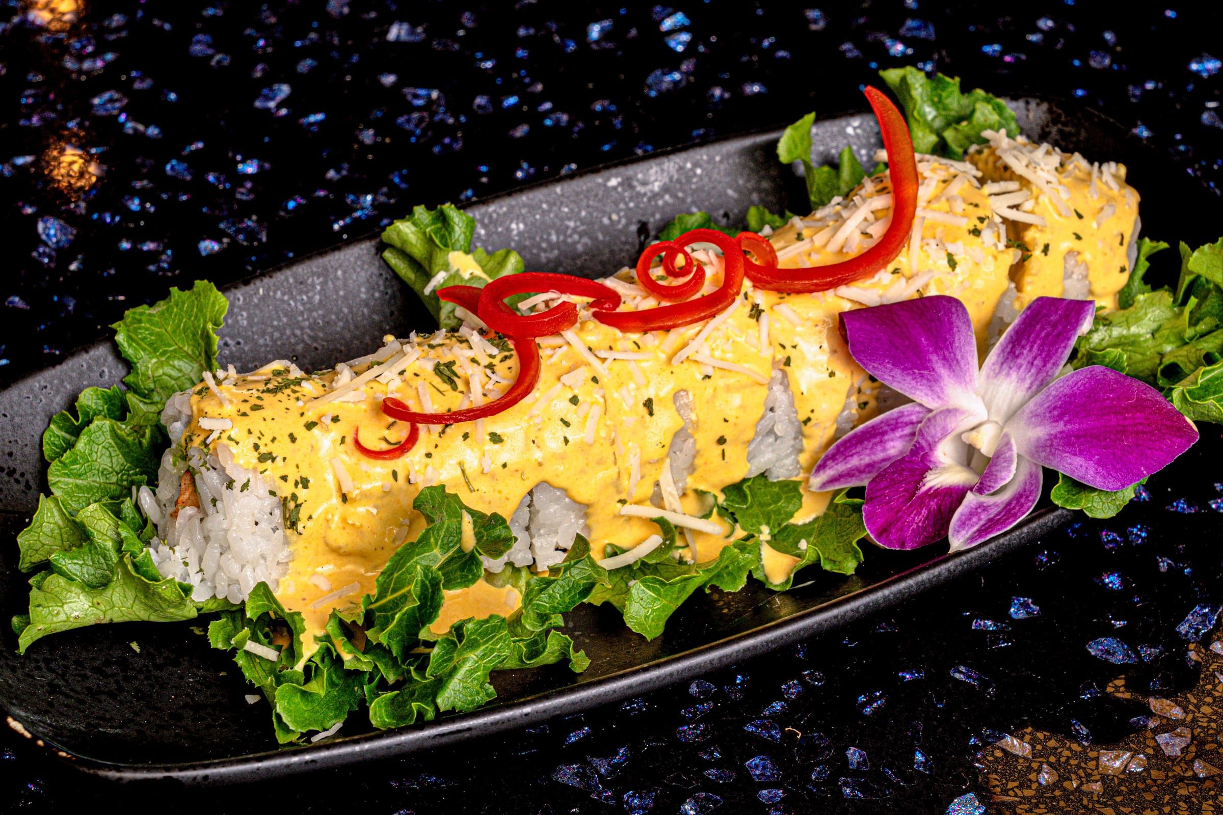 Huancaina maki roll with yellow sauce