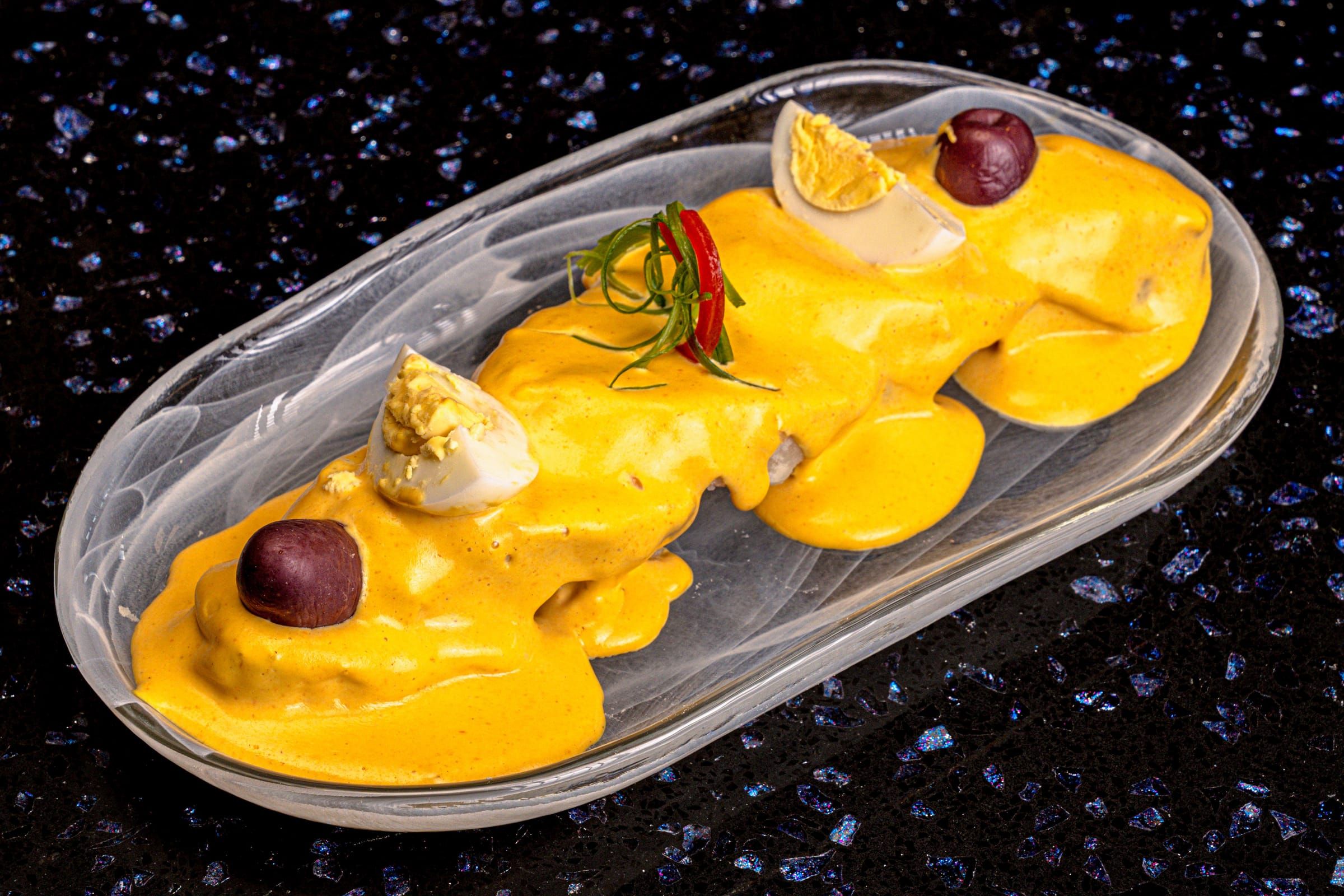 Potatoes with yellow huancaina sauce