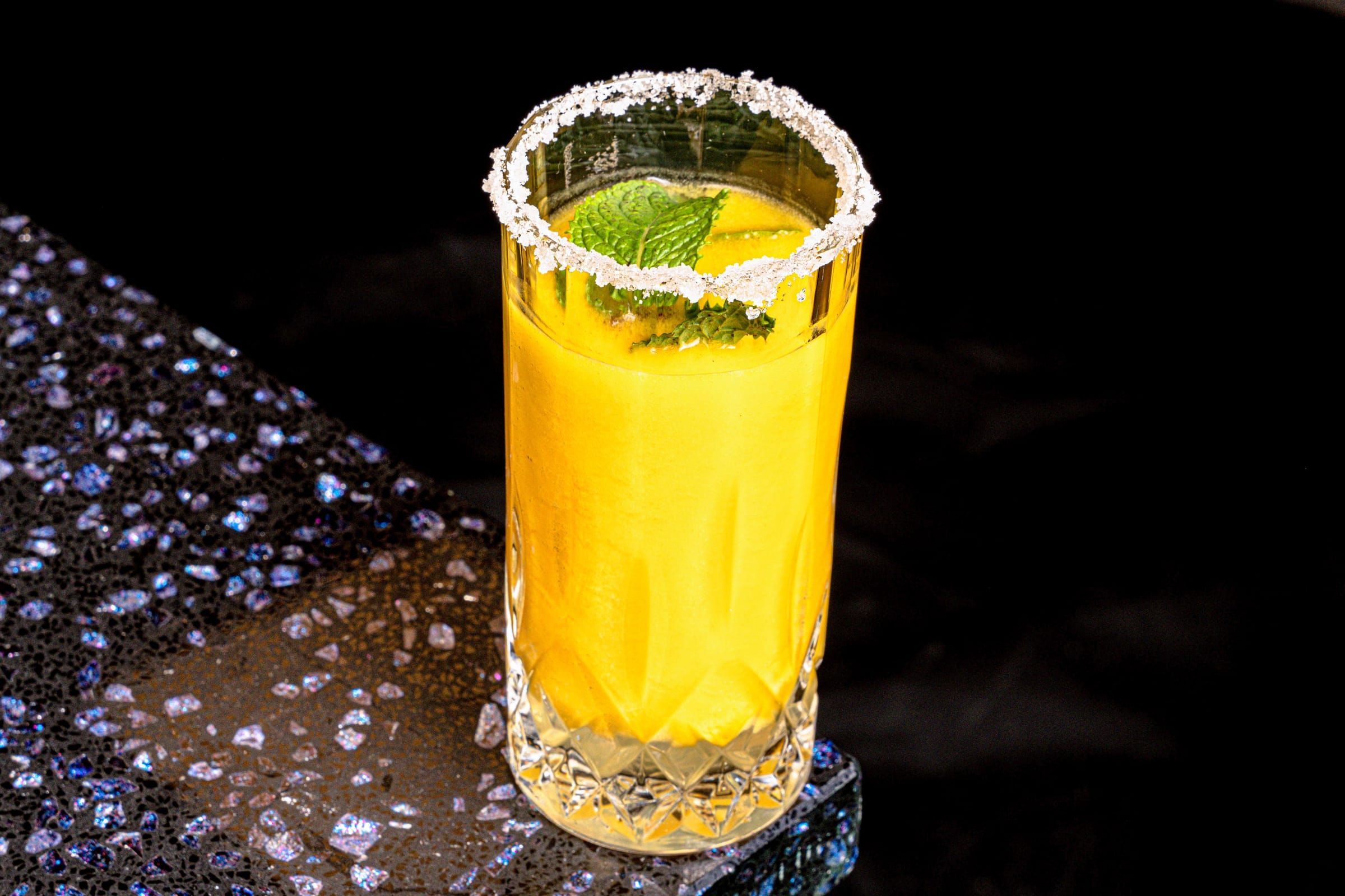 Glass of bright passion fruit juice