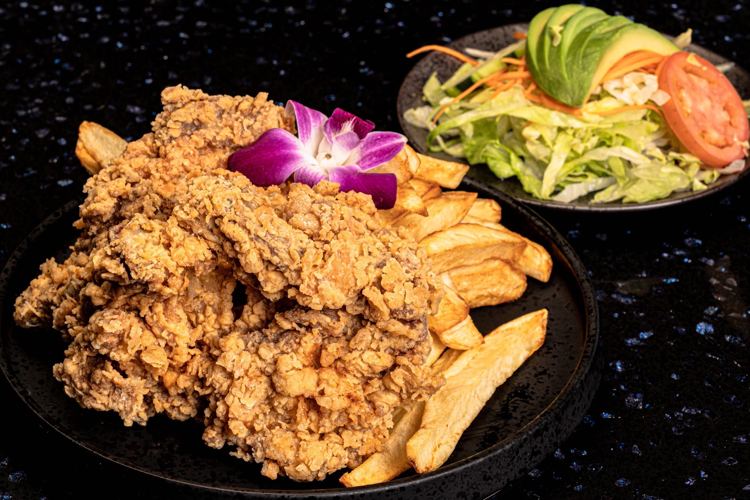 Broasted fried chicken with fries and salad