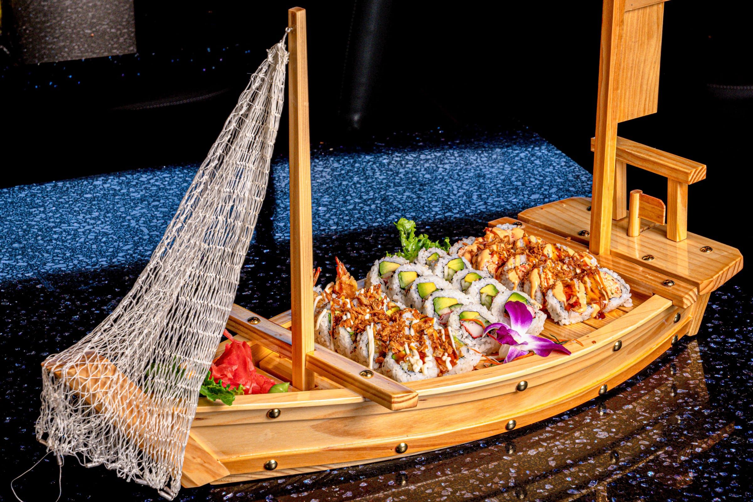 Peruvian sushi boat loaded with signature rolls