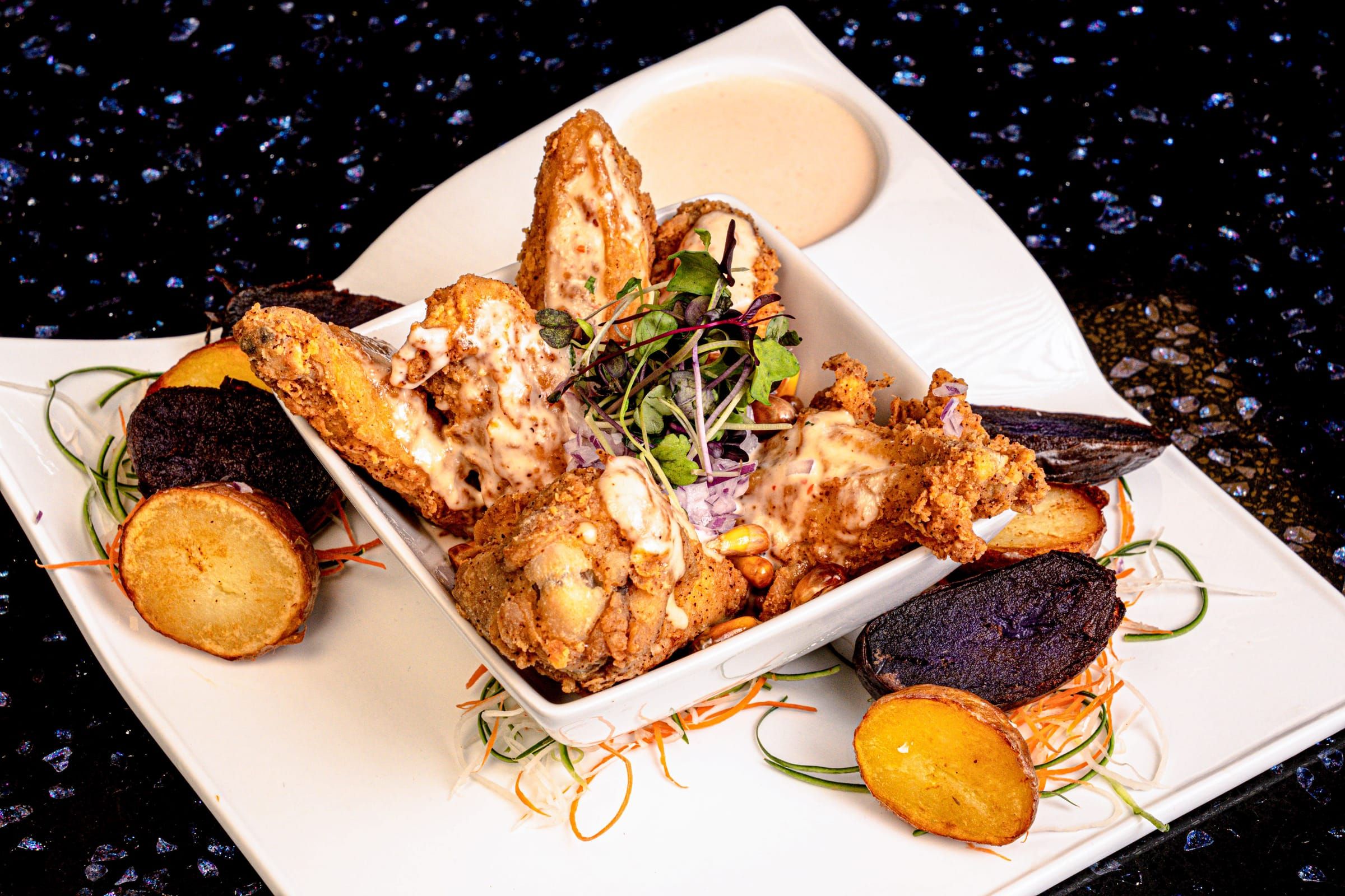 Peruvian style wings with french fries